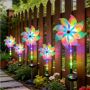 Solar pinwheel garden spike lights