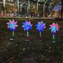 Solar pinwheel garden spike lights