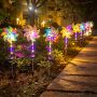 Solar pinwheel garden spike lights